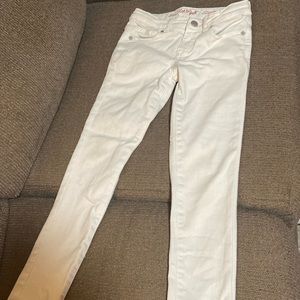 Girl’s jeans. White with 2 pockets in front 2 pockets in back. Barely worn.